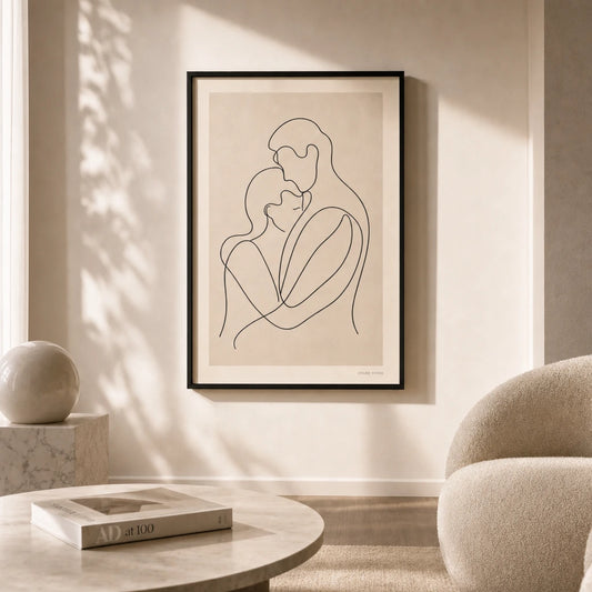 Two Lovers Embrace Poster — Continuous-line two figures embrace in thin black on cream, lifestyle in interior, Atelier Poster