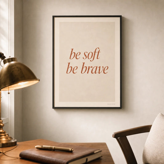 Be Soft Be Brave Poster — Two-line 'be soft be brave' italic terracotta feminine wisdom, lifestyle in interior, Atelier Poster