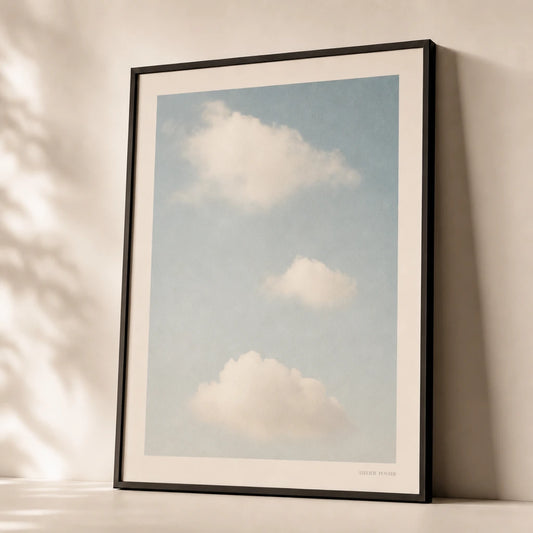 Oversized Sky Cloud Poster — Oversized minimalist sky with three soft clouds vast blue, premium hero shot, Atelier Poster