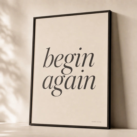 Begin Again Quiet Poster — Two-word quiet mantra 'begin again' in elegant serif italic, premium hero shot, Atelier Poster