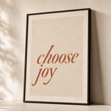 Choose Joy Soft Poster — Handwritten serif italic 'choose joy' terracotta wellness, premium hero shot, Atelier Poster
