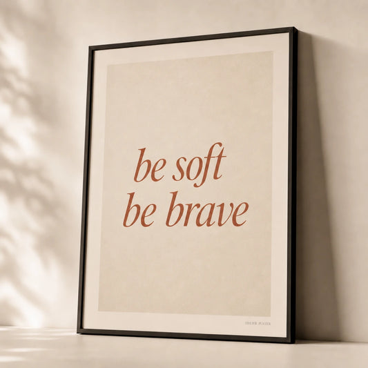 Be Soft Be Brave Poster — Two-line 'be soft be brave' italic terracotta feminine wisdom, premium hero shot, Atelier Poster