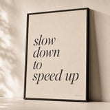 Slow Down To Speed Up Poster — Elegant serif italic 'slow down to speed up' paradox, premium hero shot, Atelier Poster