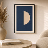 Deep Navy Moon Poster — Cream half-moon on deep navy moody nocturne minimalist, lifestyle in interior, Atelier Poster