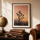 Joshua Tree Desert Poster — Joshua Tree silhouettes against pink-ochre desert sunset, lifestyle in interior, Atelier Poster