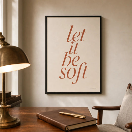 Let It Be Soft Poster — Handwritten serif italic 'let it be soft' wellness terracotta, lifestyle in interior, Atelier Poster