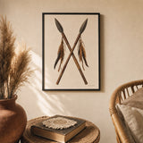 Tribal Spear Pair Poster — Two crossed tribal spears with leather and feathers, lifestyle in interior, Atelier Poster