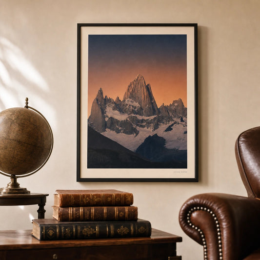 Patagonia Mountain Poster — Patagonia Fitz Roy peaks against terracotta to navy sky, lifestyle in interior, Atelier Poster