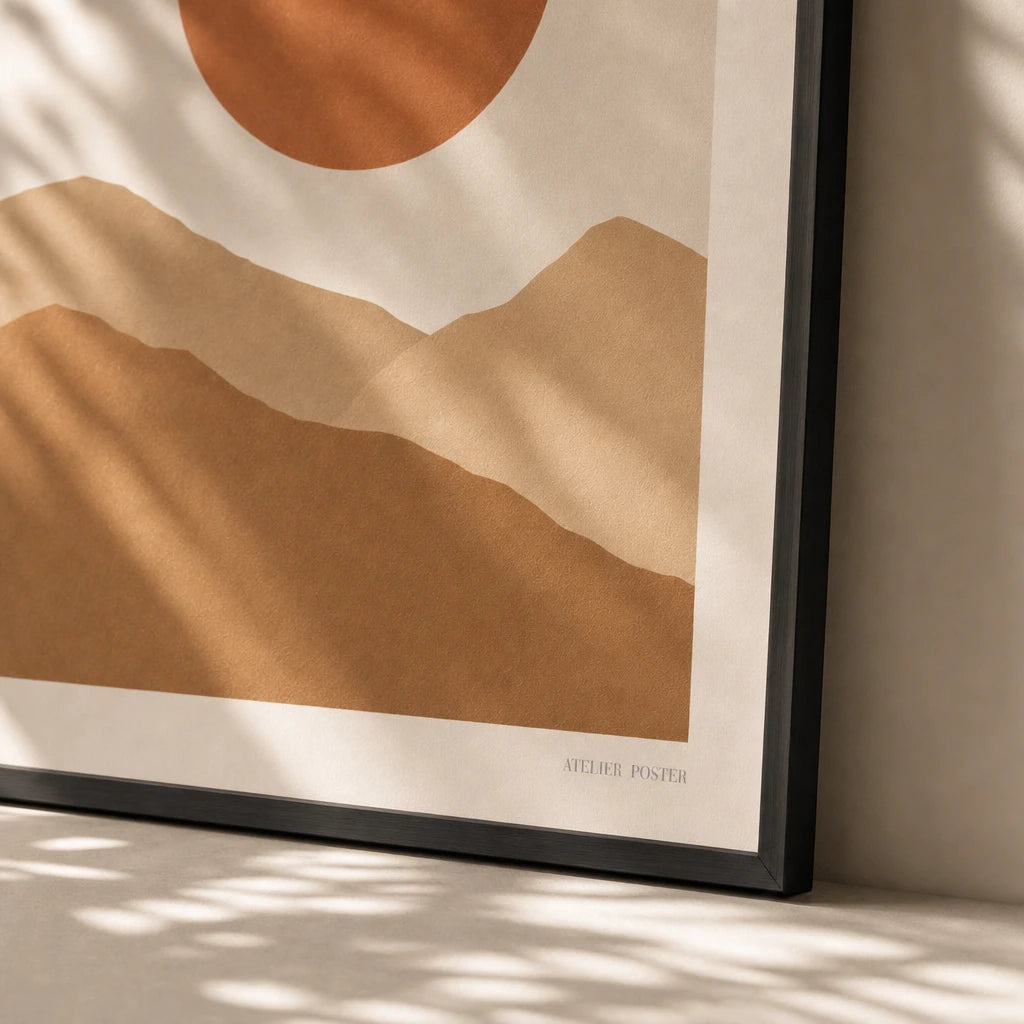 Terracotta Sun Mountains Poster — Terracotta sun behind ochre desert mountains warm earth tones, close-up detail of print, Atelier Poster