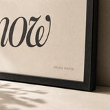 Be Here Now Poster — Elegant serif italic 'be here now' Ram Dass present moment, close-up detail of print, Atelier Poster
