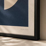 Deep Navy Moon Poster — Cream half-moon on deep navy moody nocturne minimalist, close-up detail of print, Atelier Poster