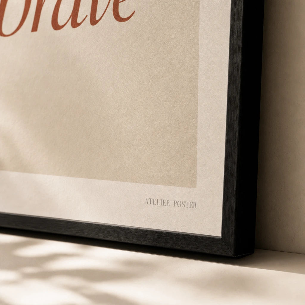 Be Soft Be Brave Poster — Two-line 'be soft be brave' italic terracotta feminine wisdom, close-up detail of print, Atelier Poster